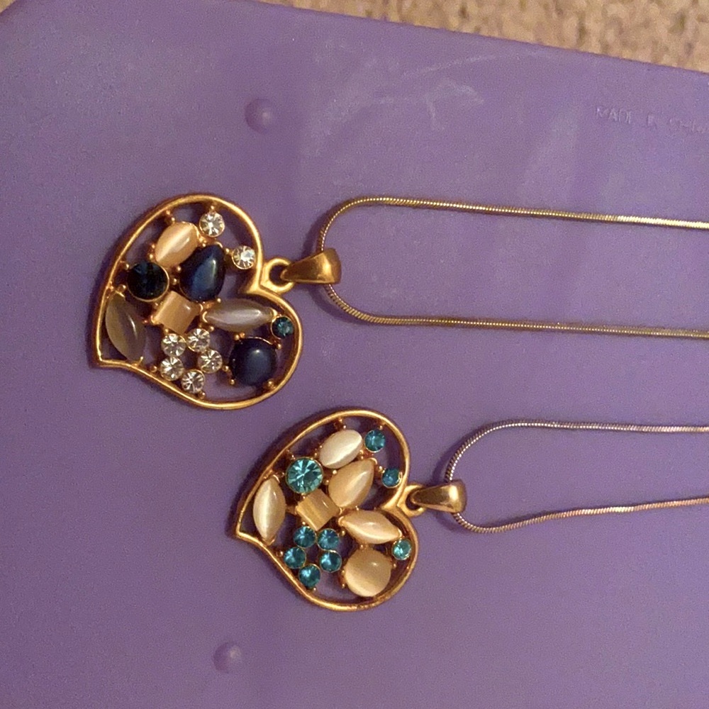 2 blue and gold heart necklaces